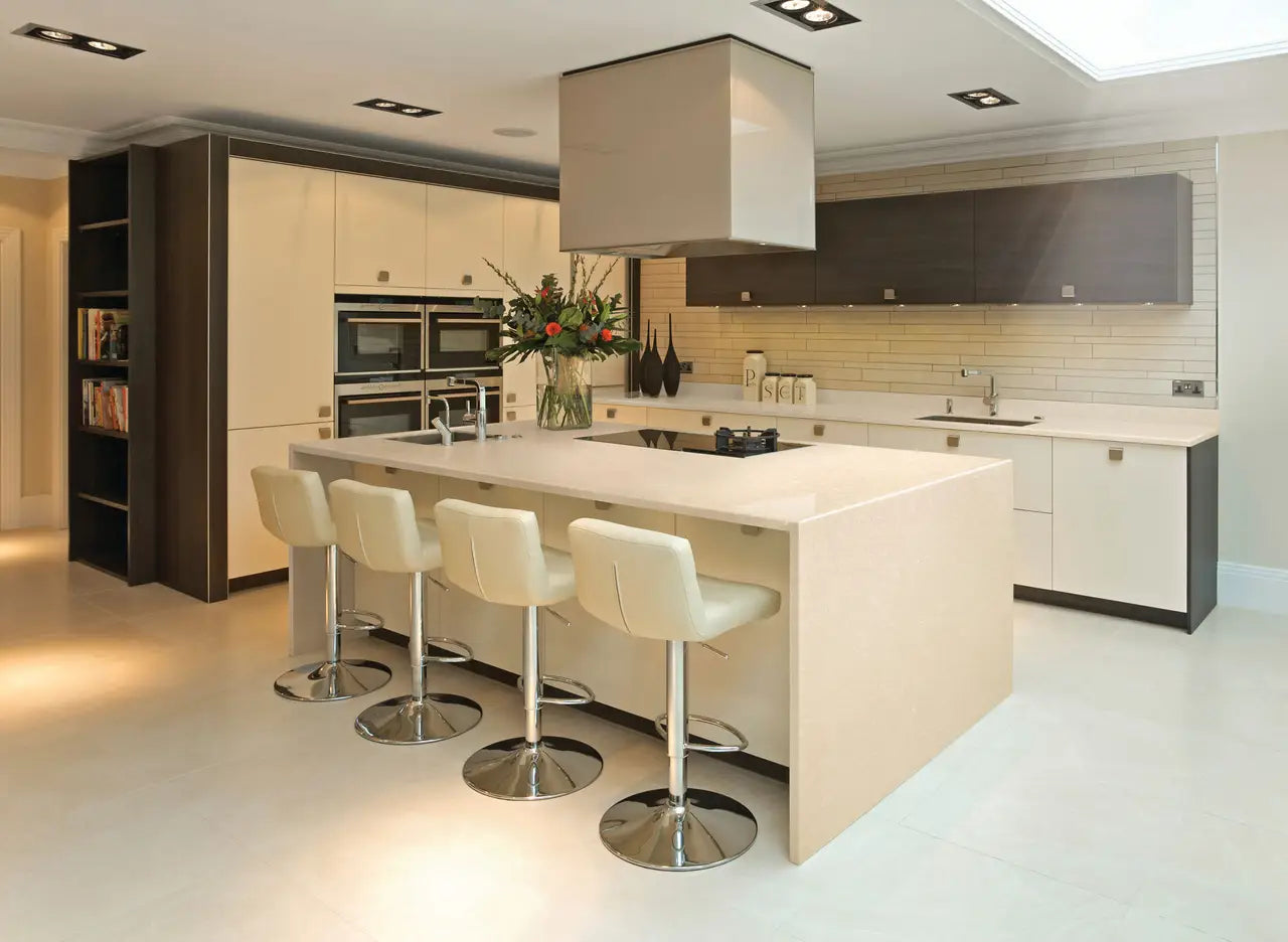 Quartz kitchen island and perimeter countertops with white finish and clean edges — premium stone countertops installed by Signature Stone Las Vegas