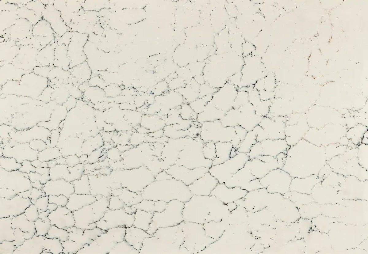 Falconwood quartz surface with cream base and intricate gray veining pattern — custom countertops fabricated and installed by Signature Stone LV