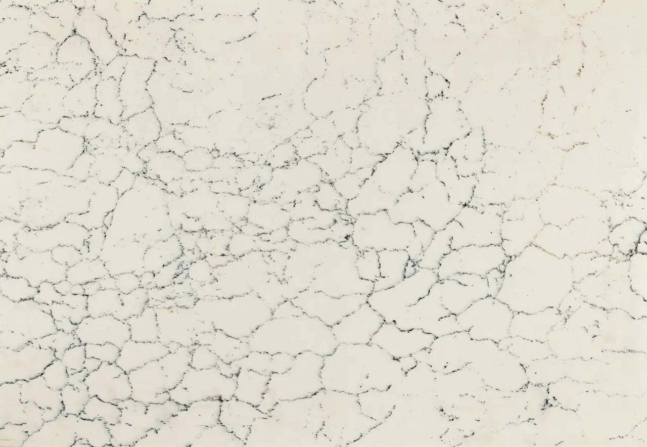 Falconwood quartz surface with cream base and intricate gray veining pattern — custom countertops fabricated and installed by Signature Stone LV