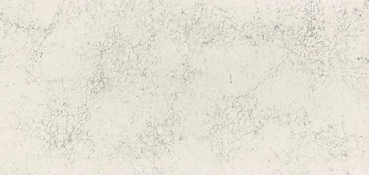Falconwood quartz surface featuring warm beige tones with intricate veining patterns — premium countertop fabrication by Signature Stone Las Vegas
