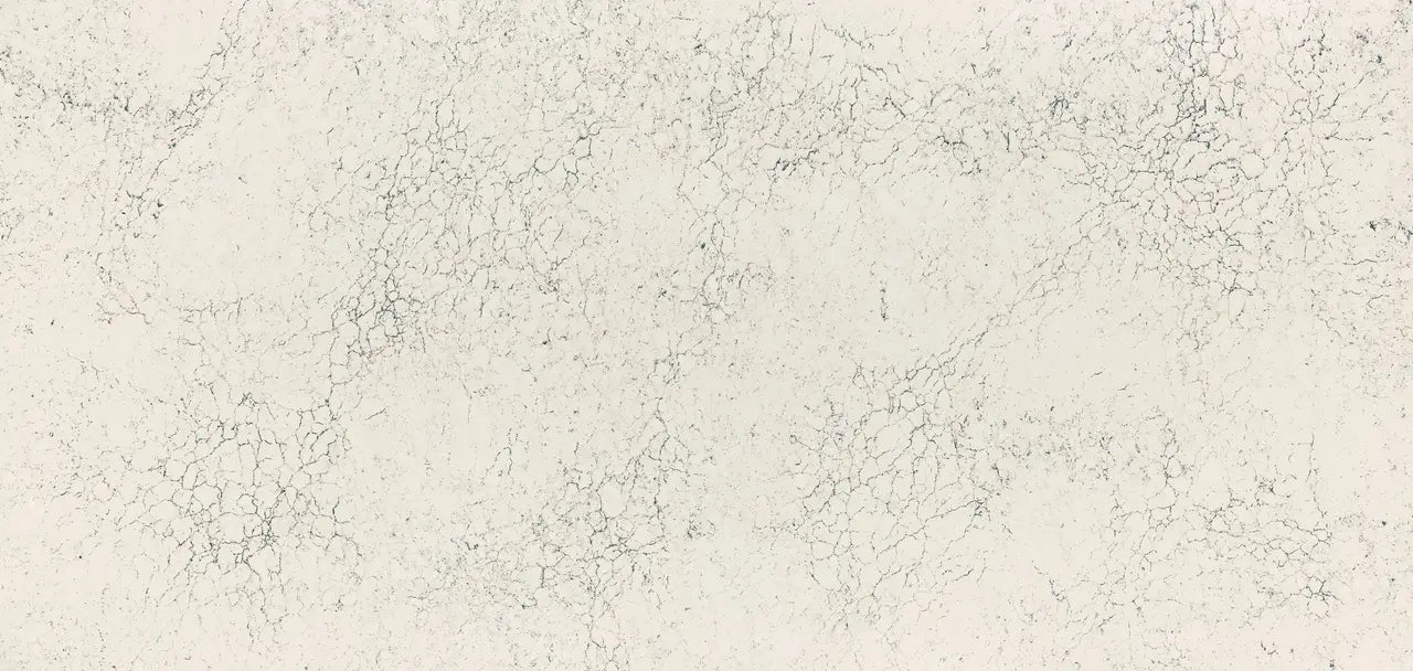 Falconwood quartz surface featuring warm beige tones with intricate veining patterns — premium countertop fabrication by Signature Stone Las Vegas