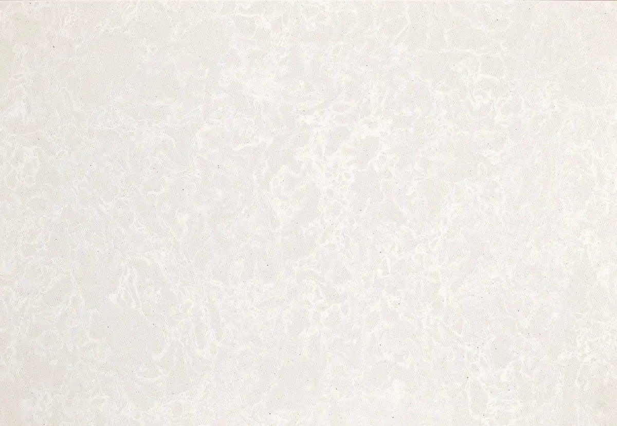 Quartz slab surface with soft gray and white veining and polished finish — custom countertops fabricated and installed by Signature Stone LV