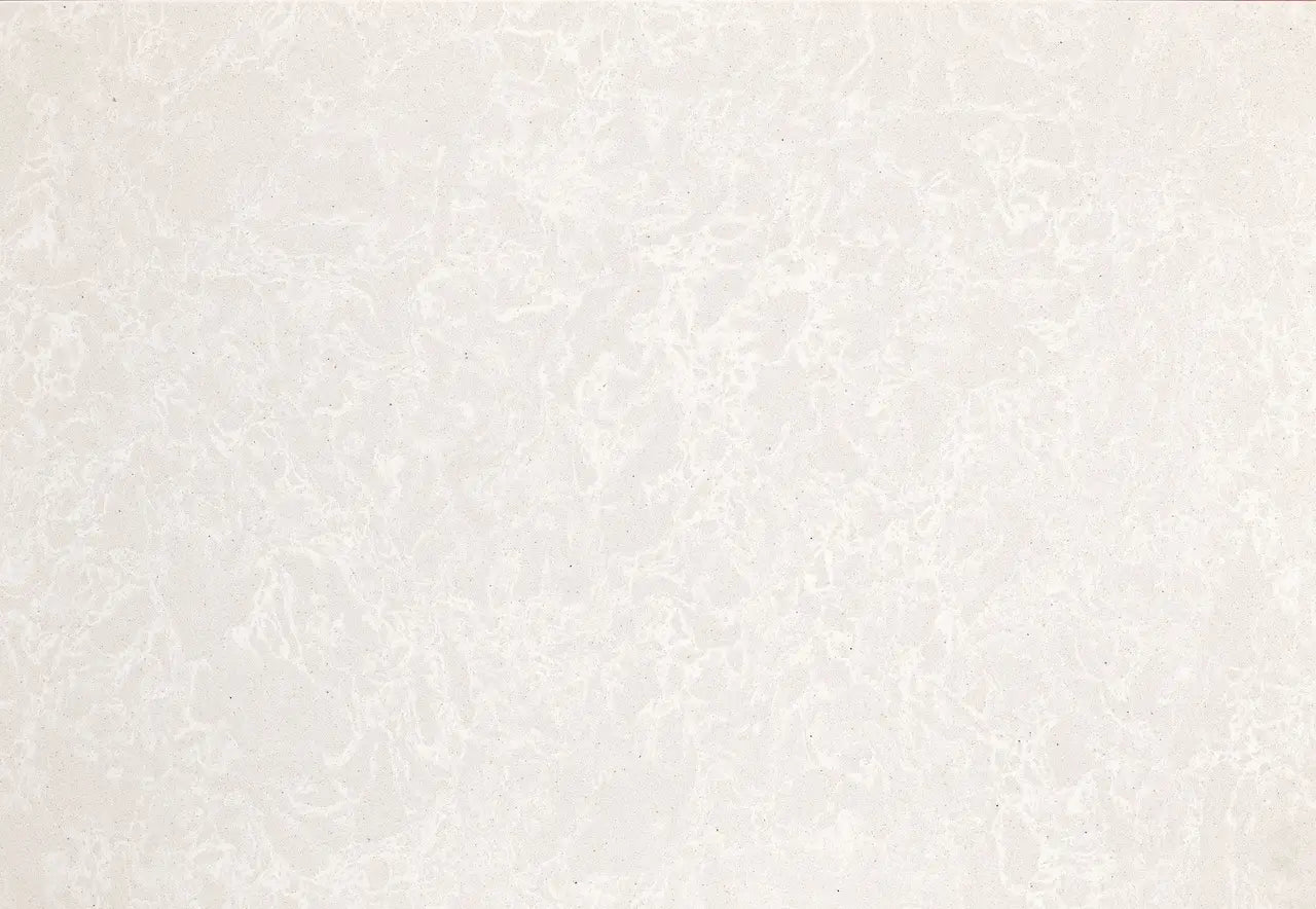 Quartz slab surface with soft gray and white veining and polished finish — custom countertops fabricated and installed by Signature Stone LV
