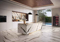 Glacier White kitchen island with book-matched veining and waterfall edges — luxury stone countertops installed by Signature Stone Las Vegas