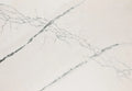 Gladstone quartz surface with white base and gray veining in polished finish — custom countertops fabricated and installed by Signature Stone LV