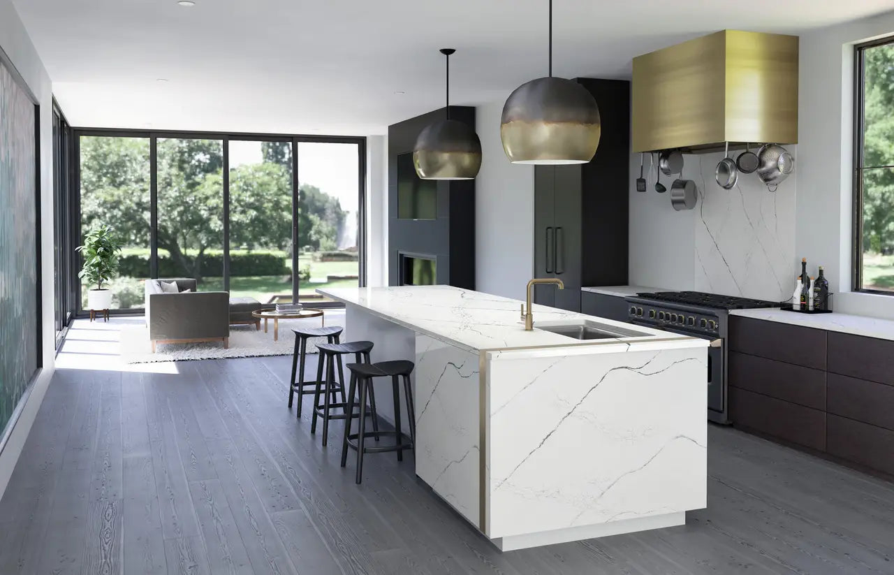 Calacatta marble kitchen island with waterfall edge and white veining — elegant stone countertops installed by Signature Stone Las Vegas