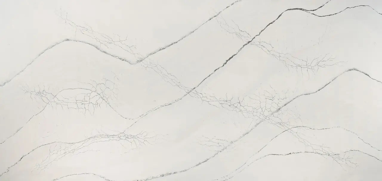 Gladstone quartz slab with elegant white base and subtle gray veining throughout — premium stone countertops installed by Signature Stone Las Vegas