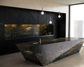 Luxurious kitchen with striking black and gold quartzite island and backsplash