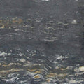 Cosmos granite countertop slab with dark gray, gold, and white swirling patterns
