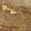 Crema Bordeaux granite slab with rich gold, cream, and brown natural stone patterns