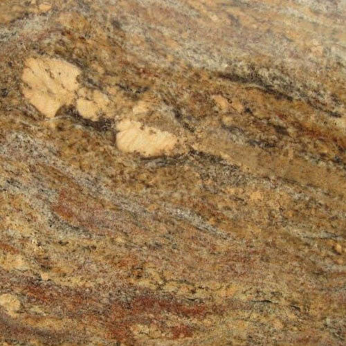 Crema Bordeaux granite slab with rich gold, cream, and brown natural stone patterns