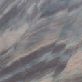 Elegant brown granite slab with natural veining, ideal for countertops and surfaces