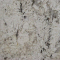 Fantastic White granite slab with creamy white background and dark mineral veining