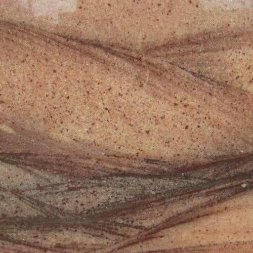 Granite countertop slab with red and brown veining, suitable for kitchen or bathroom surfaces