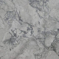 Super White granite slab with light gray and white marble-like veining, countertop surface