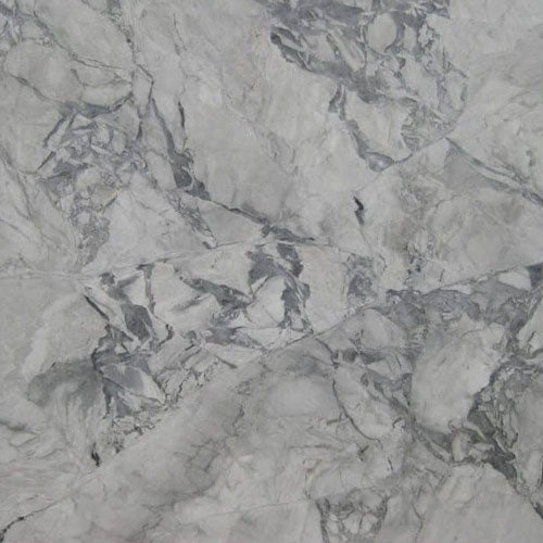 Super White granite slab with light gray and white marble-like veining, countertop surface