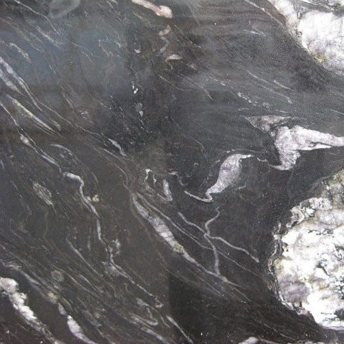 Granite countertop surface with black, white, and grey veining patterns