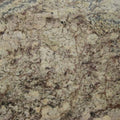Typhoon Bordeaux granite slab with beige, gold, and burgundy veining for countertops