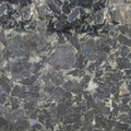 Volga Blue granite slab with dark gray, blue, and silver crystalline patterns