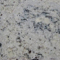 White Persa granite slab featuring light cream background with dark gray and black veining