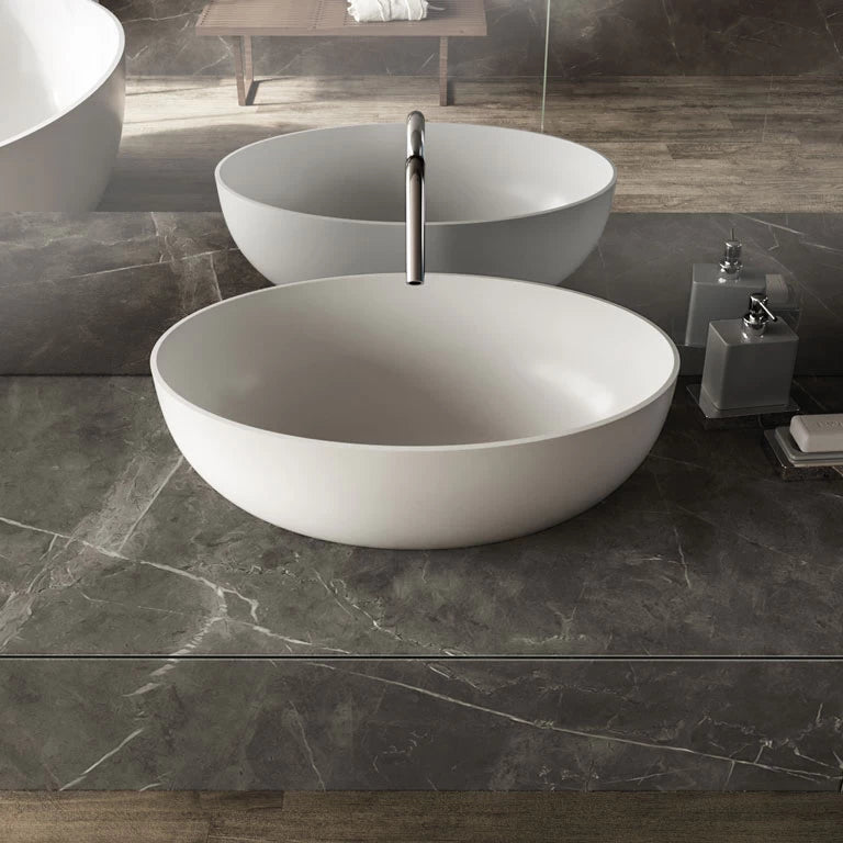 Grey marble bathroom vanity with dark veining and polished finish — elegant stone countertops installed by Signature Stone Las Vegas