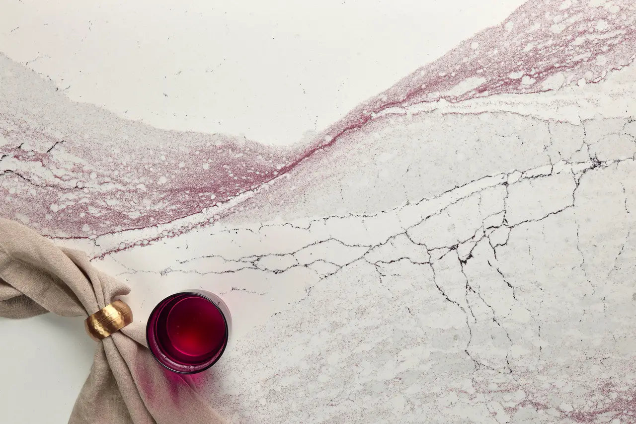 Marble surface with elegant pink and white veining and natural crack patterns — custom countertops fabricated and installed by Signature Stone LV