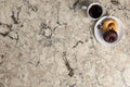 Halewood quartz surface with cream base and dark gray veining patterns — premium stone countertops installed by Signature Stone Las Vegas