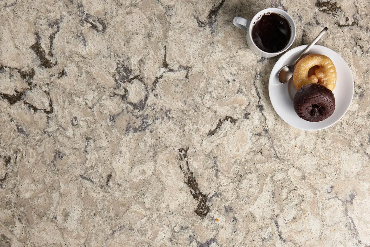 Halewood quartz surface with cream base and dark gray veining patterns — premium stone countertops installed by Signature Stone Las Vegas