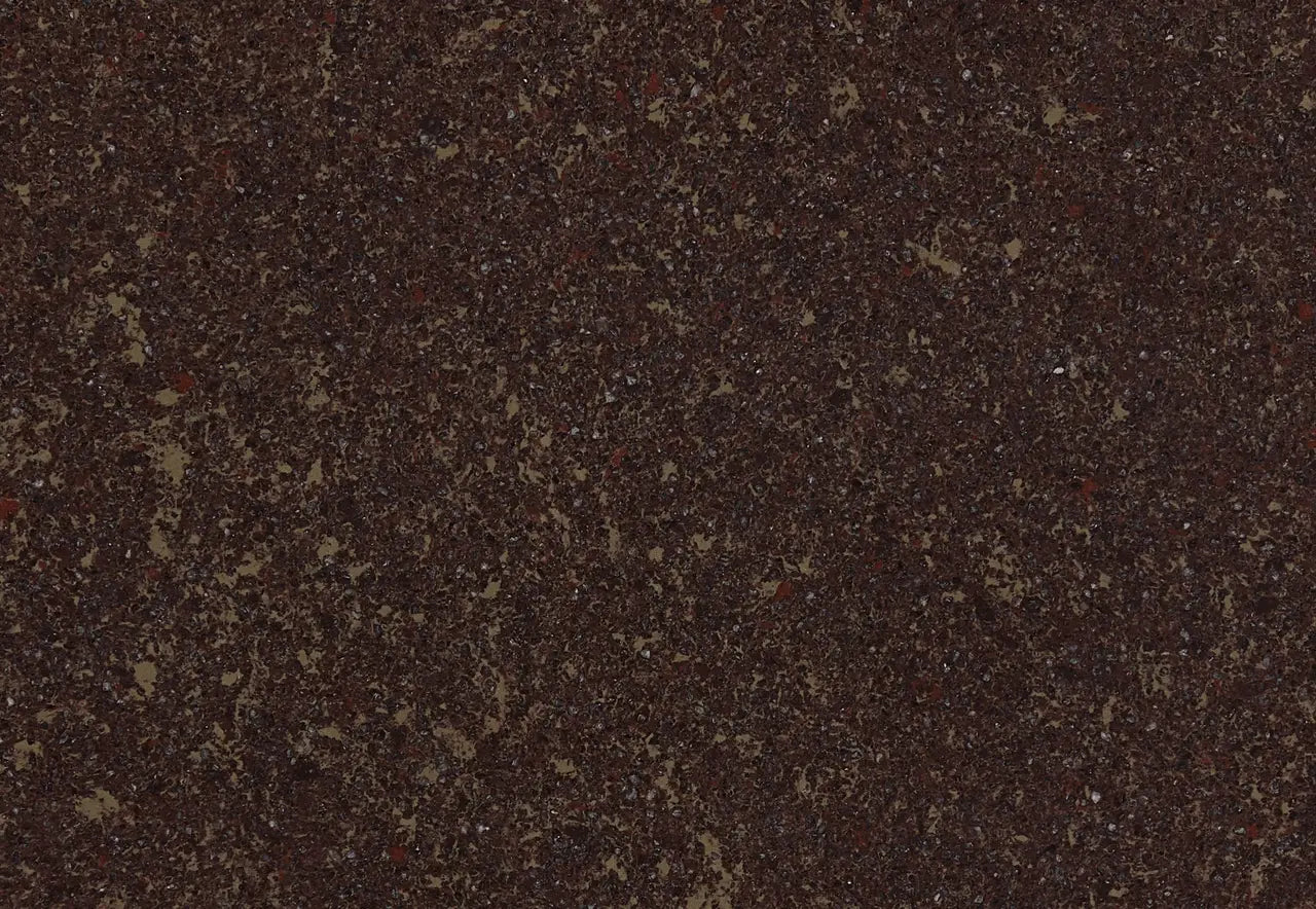 Quartz slab with rich brown base and multicolored speckled pattern — premium stone countertops installed by Signature Stone Las Vegas