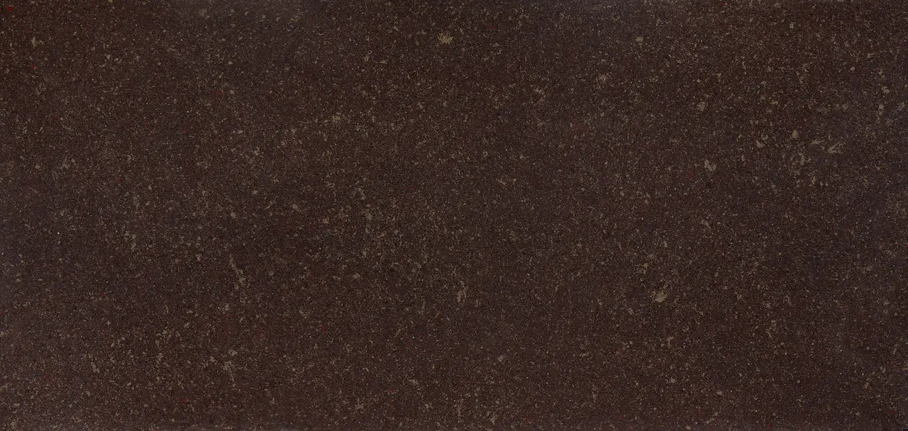 Quartz surface with rich brown speckled finish and subtle golden highlights — custom countertops fabricated and installed by Signature Stone LV