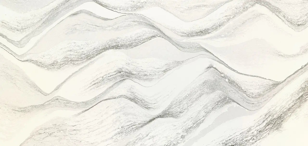 Harlow quartz surface featuring flowing gray and white veining with polished finish — custom countertops fabricated and installed by Signature Stone LV