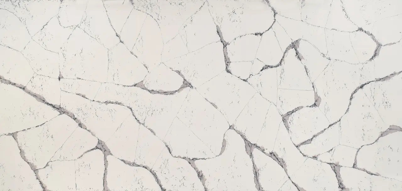 Harrogate quartz slab with light cream base and gray veining pattern — ideal for custom countertops fabricated and installed by Signature Stone LV
