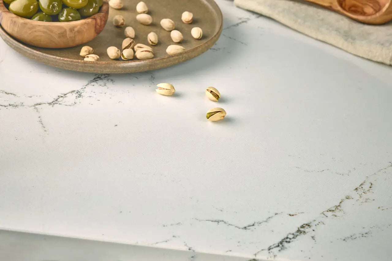 Hawksmoore marble surface with white background and subtle gray veining — custom countertops fabricated and installed by Signature Stone LV