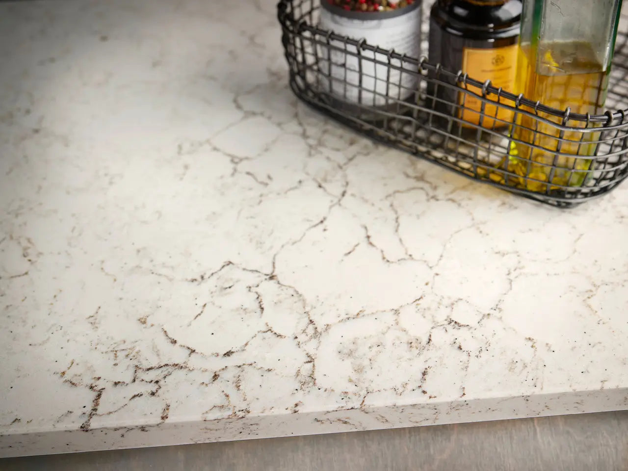 Quartz kitchen countertop with white marble veining and polished finish — custom countertops fabricated and installed by Signature Stone LV
