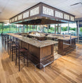 Granite bar countertops with speckled pattern and polished finish in modern restaurant — premium stone countertops installed by Signature Stone Las Vegas