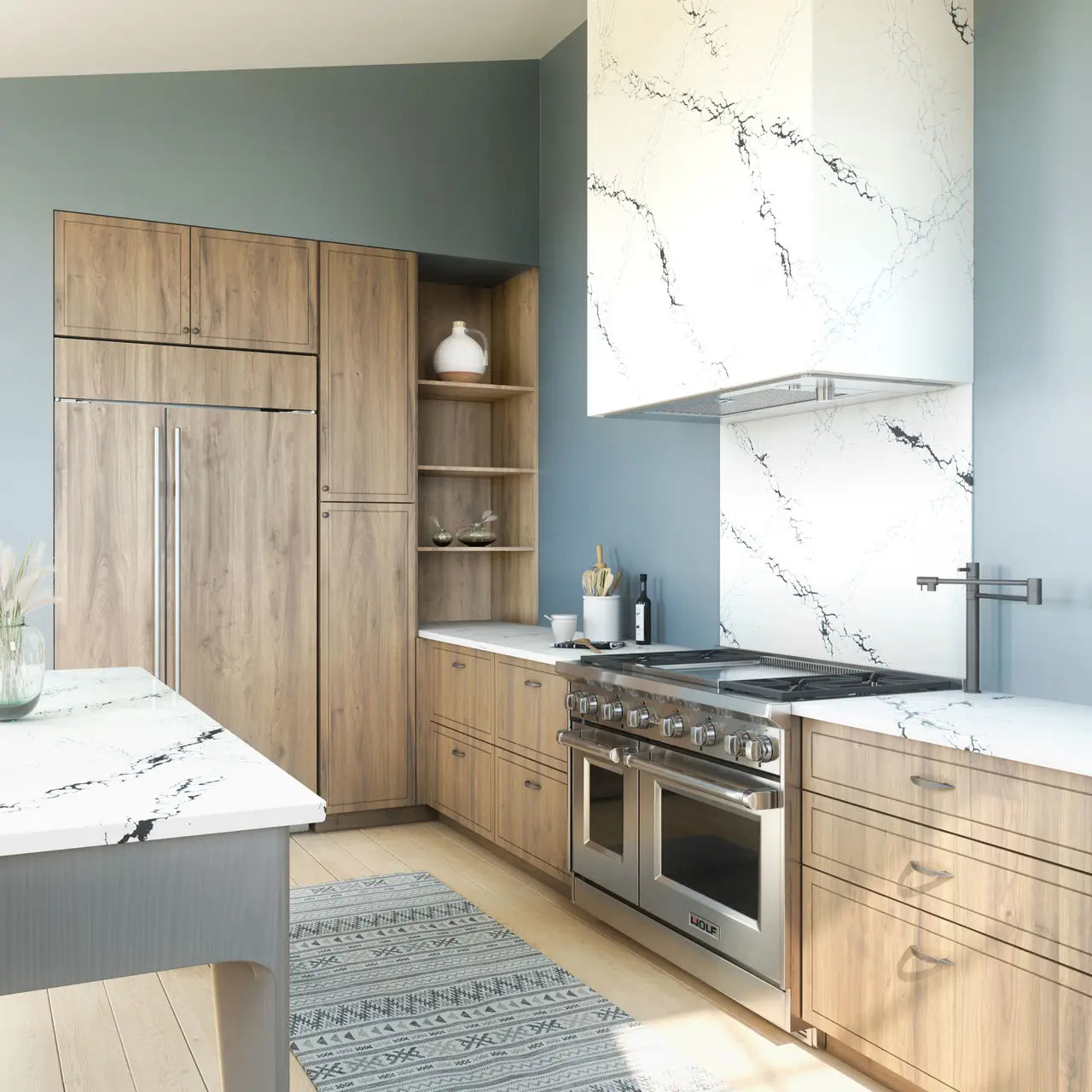 Quartz kitchen countertops with white marble veining and waterfall edge — premium stone countertops installed by Signature Stone Las Vegas