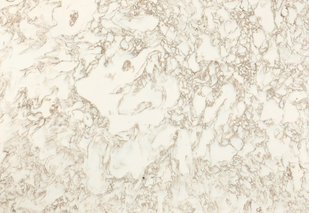 Hermitage quartz surface with creamy white background and delicate beige veining throughout — ideal for custom countertops fabricated and installed by Signat...