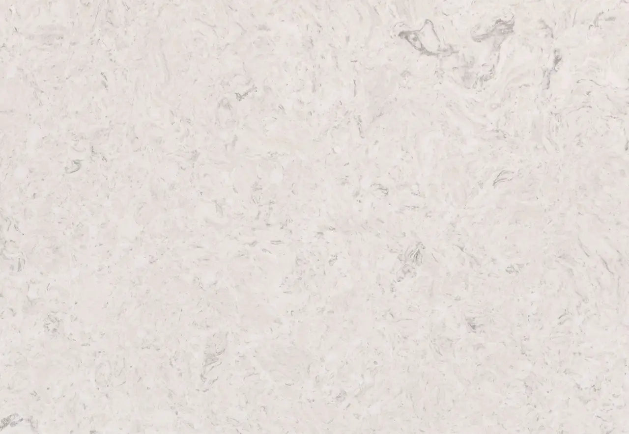Highgate quartz surface with soft white background and subtle gray veining in polished finish — custom countertops fabricated and installed by Signature Ston...