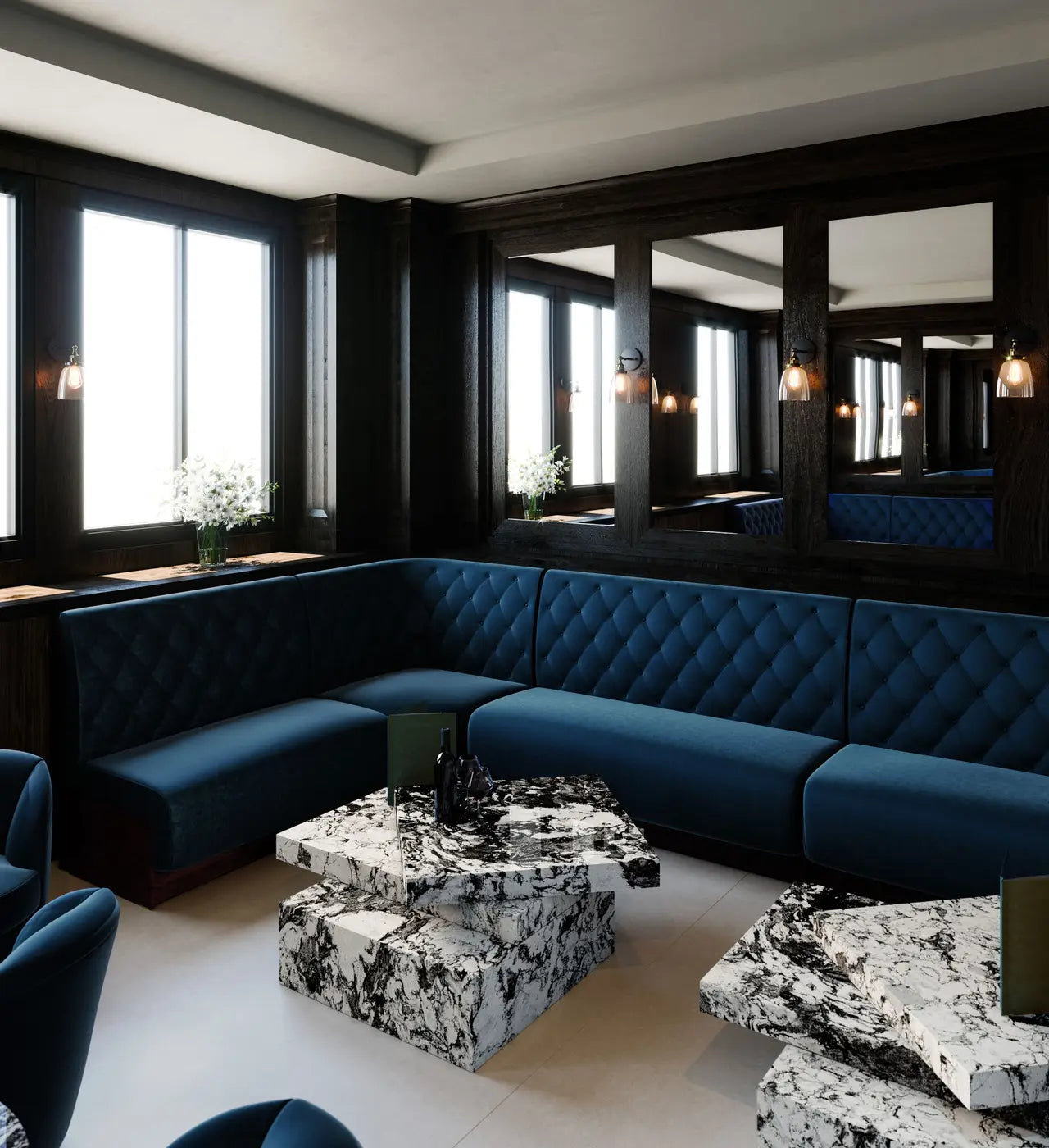 Marble coffee table with dramatic black and white veining in modern lounge seating area — expert countertop fabrication by Signature Stone Las Vegas