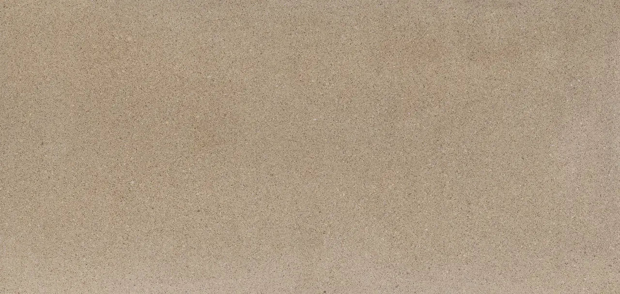 Quartz surface with warm beige tone and subtle speckled pattern — custom countertops fabricated and installed by Signature Stone LV