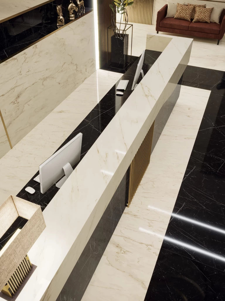 Cremo Delicato marble kitchen island with waterfall edge and rich veining — custom countertops fabricated and installed by Signature Stone LV