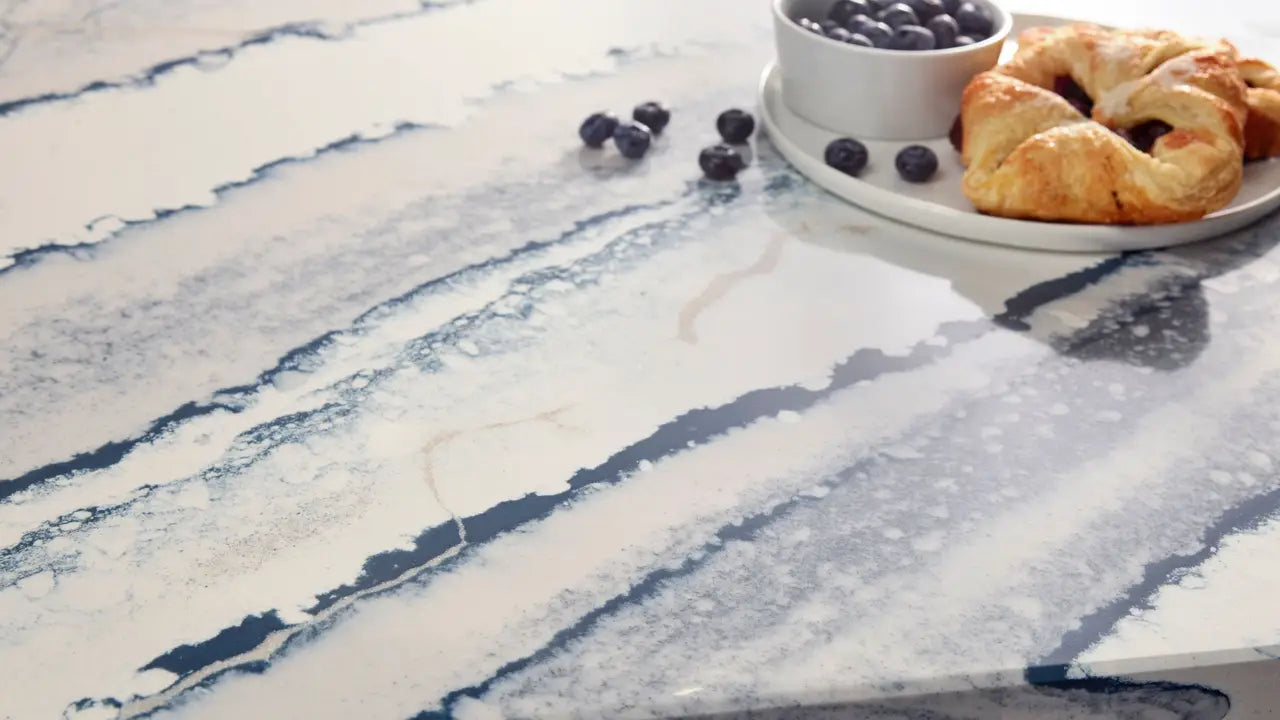 Inverness Bristol Bay quartz surface with white base and blue-gray veining — custom countertops fabricated and installed by Signature Stone LV