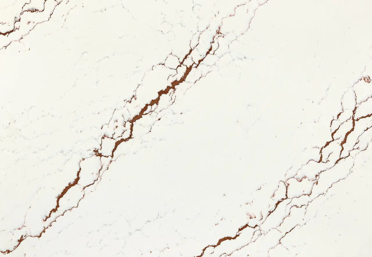 Inverness Bronze quartz surface featuring elegant white base with rich bronze veining and polished finish — premium countertop fabrication by Signature Stone...