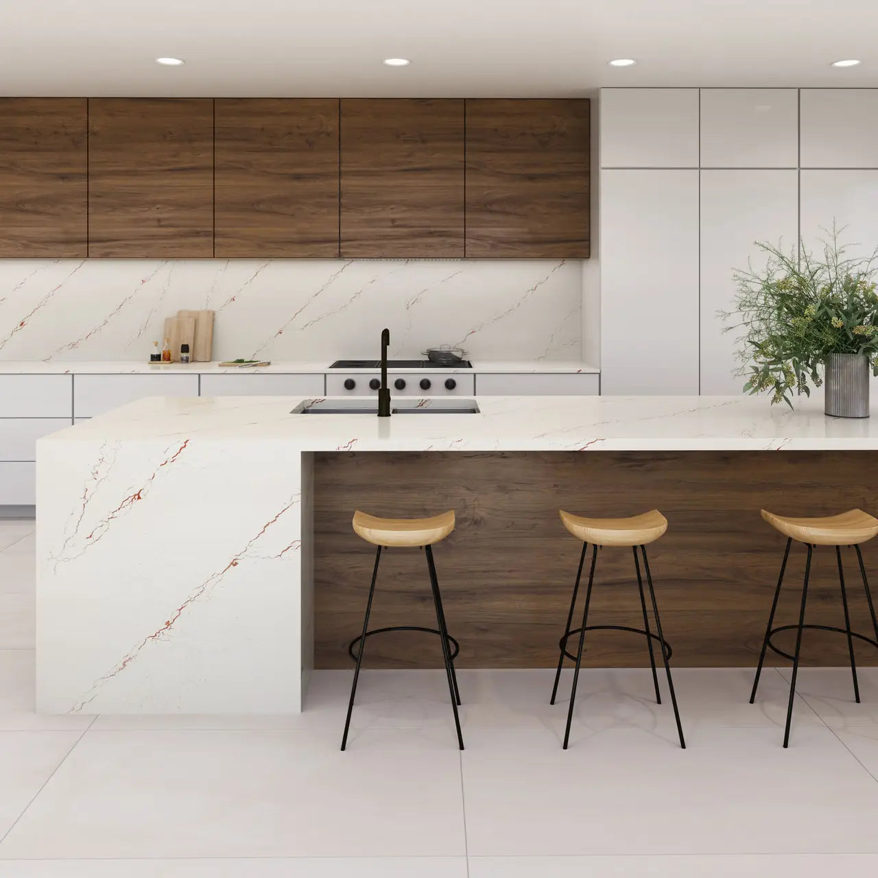 Inverness Bronze quartz kitchen island and countertops with white marble veining and sleek edges — premium stone countertops installed by Signature Stone Las...
