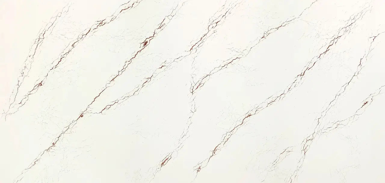 Inverness Bronze quartz surface featuring elegant white base with flowing bronze veining and polished finish — custom countertops fabricated and installed by...