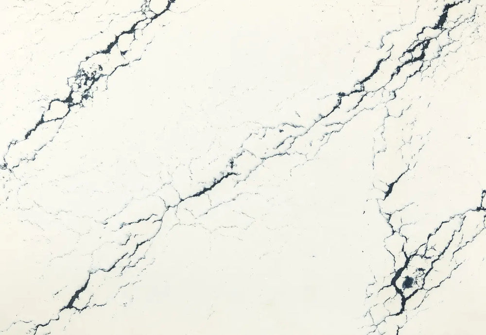 Inverness Cobalt quartz slab with cream base and bold navy blue veining — premium countertop fabrication by Signature Stone Las Vegas