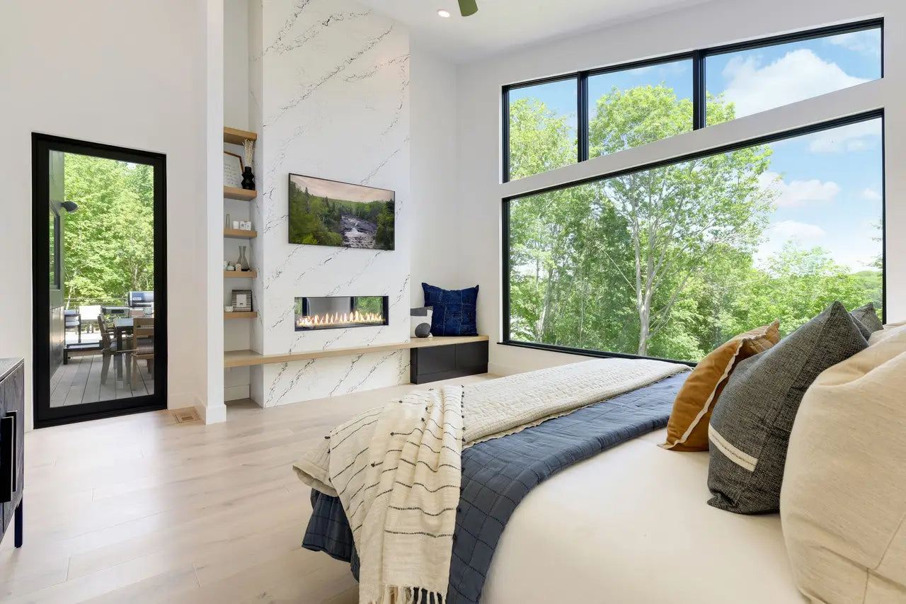 Inverness Cobalt quartz bedroom fireplace surround with white veining and polished finish — expert countertop fabrication by Signature Stone Las Vegas