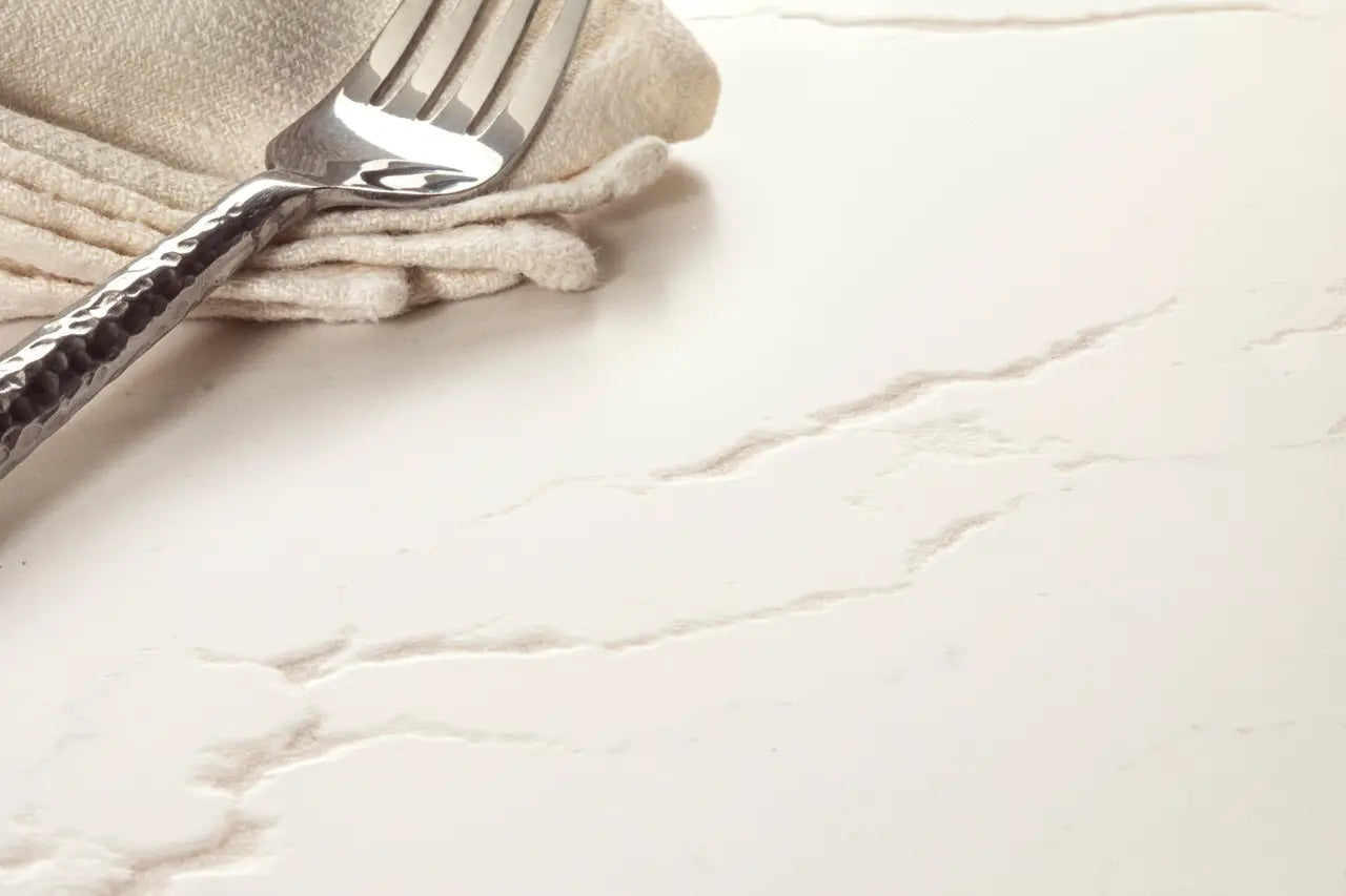 Inverness Frost quartz surface with elegant cream veining and polished finish — premium countertop fabrication by Signature Stone Las Vegas