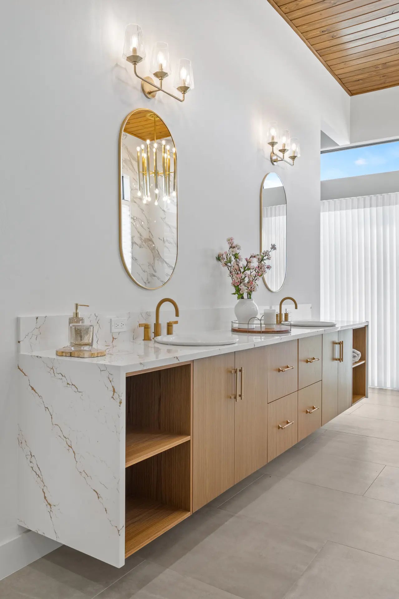 Inverness Gold bathroom vanity with white marble veining and polished finish — elegant stone countertops installed by Signature Stone Las Vegas