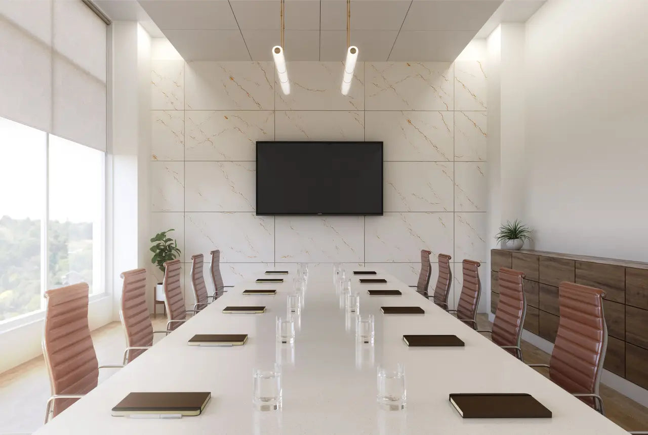Inverness Gold conference table with white marble-like finish and gold veining — custom countertops fabricated and installed by Signature Stone LV